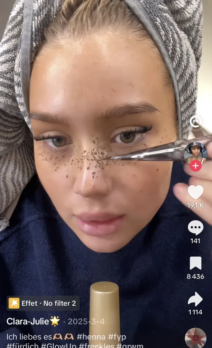A TikTok henna tutorial for drawing on fake freckles