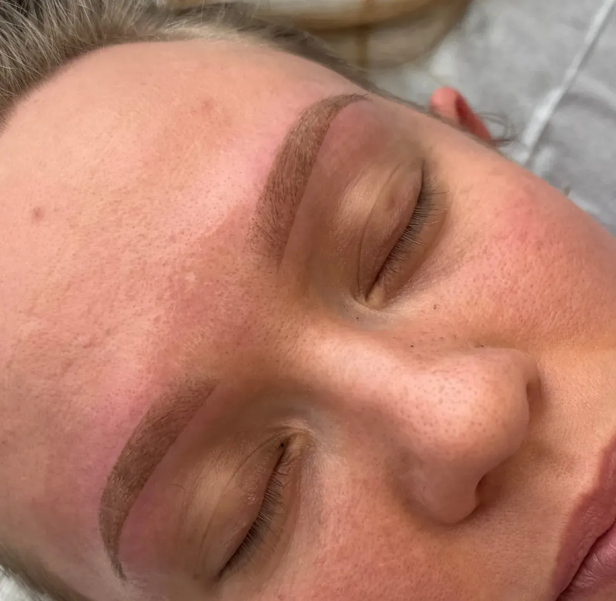 Blonde client right after powder brows