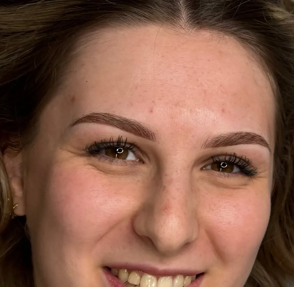 Dark blonde client right after powder brows