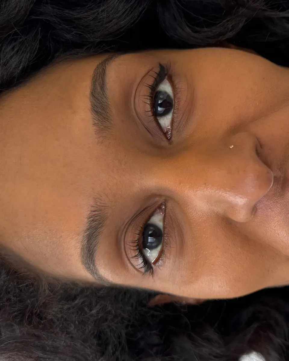 Client with Black skin before powder brows