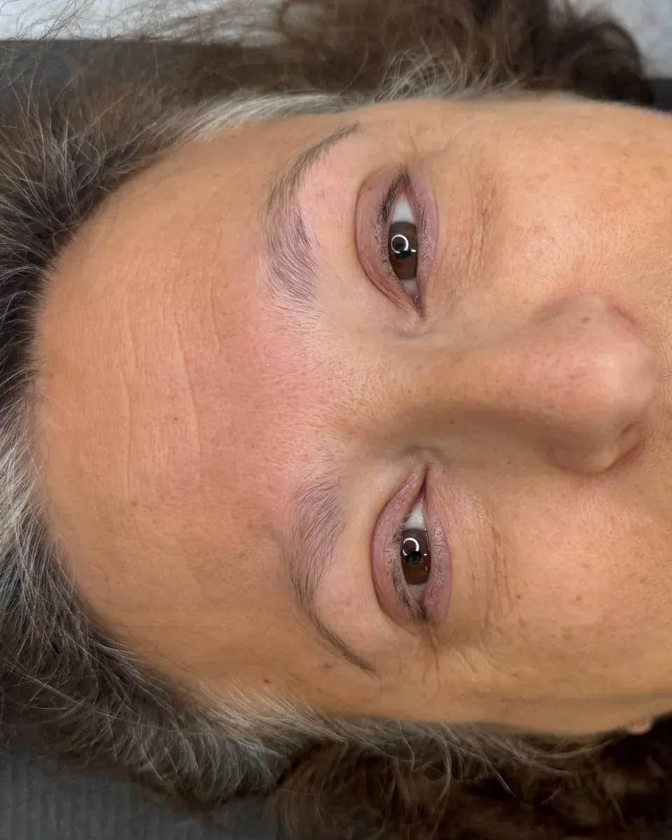 Client with mature, combination-to-oily skin, before powder brows